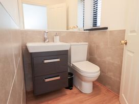 A bathroom with a sink and toilet at Glen Lea in Giggleswick, Settle