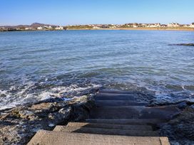 Steps leading down to the water near houses at Apartment 3 in Trearddur Bay