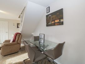 A dining room with a table and chairs at Top Lodge in Llanvair-Discoed near Penhow