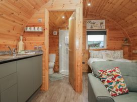 A studio with kitchen, bathroom and sleeping area at Beech in Ulverston