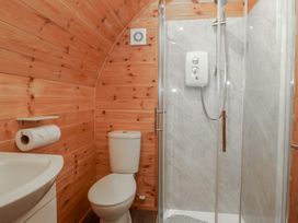 A bathroom with a shower and toilet at Beech in Ulverston