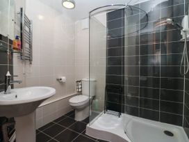 A bathroom with a shower and toilet at Kexby House