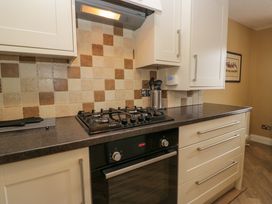 A kitchen with gas hob and oven at Jenny's in Hawkshead