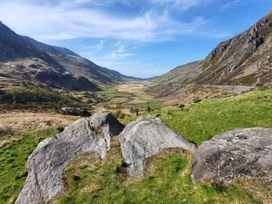 A view of mountains and a valley with rocks at Top Of The Lane Luxury Holiday Apartment in Benllech