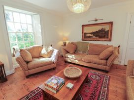 A living room with two sofas and a coffee table at Garsdale Foot in Sedbergh