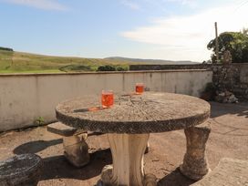 An outdoor table with drinks at Garsdale Foot in Sedbergh