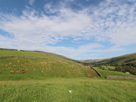 A valley with grass and stone walls at Garsdale Foot Sedbergh