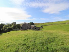 A view of houses and grassland at Garsdale Foot in Sedbergh