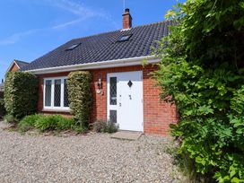 A house with a front door and windows at Seadrift Dunwich Near Westleton