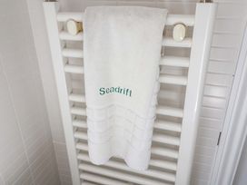 A towel hanging on a towel rack at Seadrift in Dunwich Near Westleton