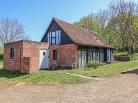 A house with a garden and pathway at The Cart House Sudbourne Near Orford