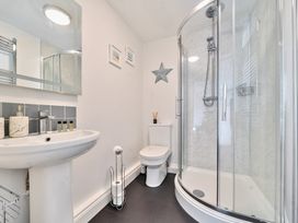 A bathroom with a sink toilet shower and mirror at Bedingfield House nr Debenham Debenham
