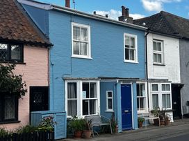 A blue house with a blue door and windows in Aldeburgh