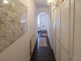 A hallway with a map on the wall at High Ground, Reydon