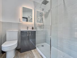 A bathroom with a shower and toilet at The Annex in Wimborne Minster