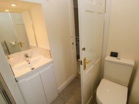 A bathroom with a sink and toilet at North Studdock Cottage Angle near Pembroke