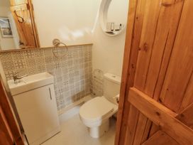 A bathroom with a sink and toilet at White House in Shap
