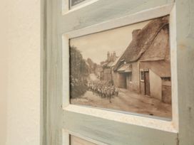 A vintage photograph of sheep on a street at Wayside near Kingsbridge