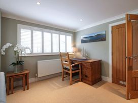 A home office with a desk and chair at Welsummer in Salcombe