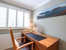 An office with a desk and chair at Welsummer in Salcombe