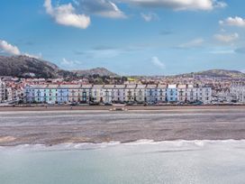 A view of coastal houses along a beach at The Keep in Llandudno