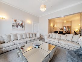 A living room with sofas and a coffee table at The Keep in Llandudno