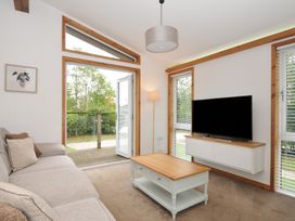 A living room with a sofa and television at 3 Southern Place in Dobwalls