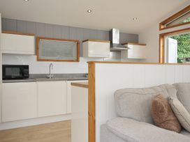 A kitchen with a microwave and sink at 3 Southern Place in Dobwalls