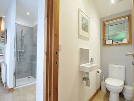 A bathroom featuring a shower, toilet, and sink at 3 Southern Place Dobwalls