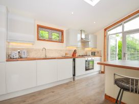 A kitchen with modern appliances and a window at 5 Faraway Fields in Dobwalls