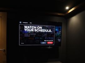 A television screen displaying a streaming service interface at 24 Meadow Retreat in Dobwalls