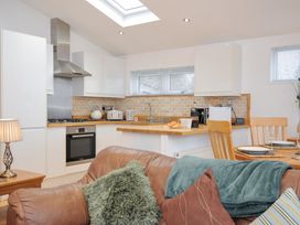 A kitchen with countertops and seating area at 15 Faraway Fields in Dobwalls