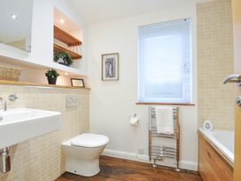 A bathroom with a sink a toilet and a bathtub at 15 Faraway Fields Dobwalls