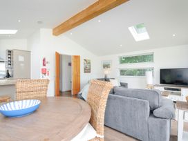 A living room with a sofa and television at 1 Horizon View in Dobwalls