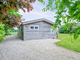 A house with a gravel path and garden at 1 Horizon View in Dobwalls