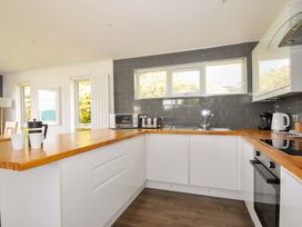 A kitchen with a sink and appliances at 3 Horizon View Dobwalls