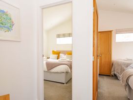 A bedroom with beds and a wardrobe at 3 Horizon View in Dobwalls
