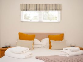 A bedroom with a bed and pillows at 3 Horizon View Dobwalls