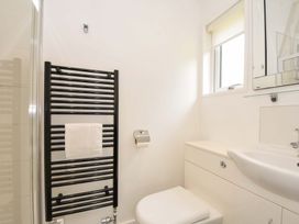 A bathroom with a toilet and sink at 3 Horizon View in Dobwalls