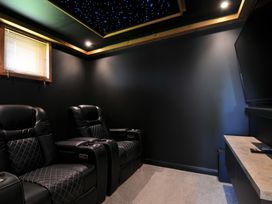 A home theater with seating and a television at 12 Meadow Retreat, Dobwalls