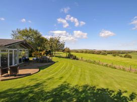 A garden with furniture and a view at 8 Horizon View in Dobwalls