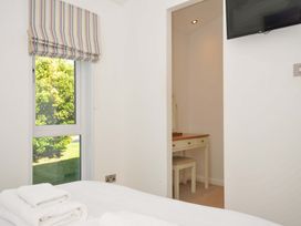 A bedroom with a desk and chair at 10 Horizon View Dobwalls