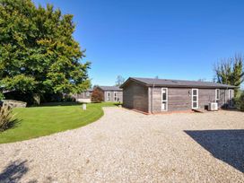 An outdoor area with buildings and trees at 10 Horizon View in Dobwalls