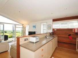 A kitchen with a sink and toaster at 11 Horizon View Dobwalls