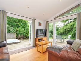 A living room with a TV and sofa at 15 Horizon View in Dobwalls
