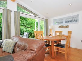 A dining room with a table and chairs at 15 Horizon View, Dobwalls