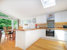 A kitchen with a table and chairs at 15 Horizon View in Dobwalls