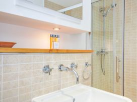 A bathroom with a sink and shower at 15 Horizon View in Dobwalls