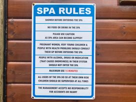 A spa rules sign with safety guidelines at 1 Hornbeam Lodge Narberth