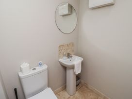 A bathroom with a toilet and sink at Crispin in Lucker